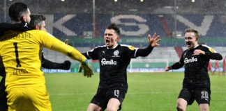 Holstein Kiel feiert die Pokal-Sensation gegen den FC Bayern Image credit: Getty Images