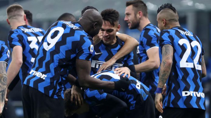 Nicolo Barella of FC Internazionale celebrates after scoring his team's second goal with team mates during the Serie A match between FC Internazionale and Juventus at Stadio Giuseppe Meazza Image credit: Getty Images