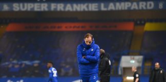 Thomas Tuchel the head coach / manager of Chelsea looks on with a banner for former head coach / manager Frank Lampard above him during the Premier League match between Chelsea and Wolverhampton Wanderers at Stamford Bridge on January 27, 2021 in London, Image credit: Getty Images