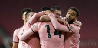 Oliver Burke of Sheffield United celebrates with Jayden Bogle and team mates after scoring their side's second goal during the Premier League match between Manchester United and Sheffield United at Old Trafford on January 27, 2021 in Manchester, England. Image credit: Getty Images