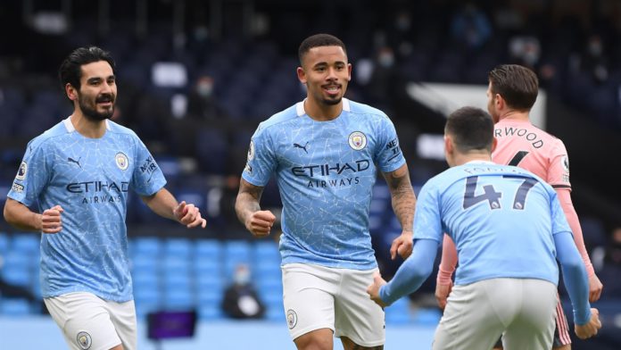 Manchester City's Brazilian striker Gabriel Jesus (C) celebrates scoring the opening goal during the English Premier League football match between Manchester City and Sheffield United at the Etihad Stadium Image credit: Getty Images