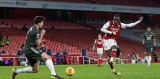 Manchester United's English defender Harry Maguire (L) blocks a shot from Arsenal's French-born Ivorian midfielder Nicolas Pepe during the English Premier League football match between Arsenal and Manchester United at the Emirates Stadium in London on Jan Image credit: Getty Images