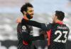 Mohamed Salah of Liverpool celebrates scoring his side's second goal with team mate Xherdan Shaqiri during the Premier League match between West Ham United and Liverpool at London Stadium Image credit: Getty Images