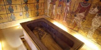 The golden sarcophagus of King Tutankhamun in his burial chamber in the Valley of the Kings