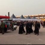 The children of the late president in shot