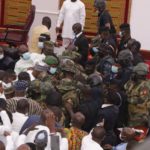 military storm parliament