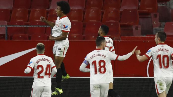 Jules Kounde of Sevilla celebrates after scoring their side's first goal during the Copa del Rey Semi Final First Leg match between Sevilla and FC Barcelona at Estadio Ramon Sanchez Pizjuan on February 10, 2021 in Seville, Spain Image credit: Getty Images