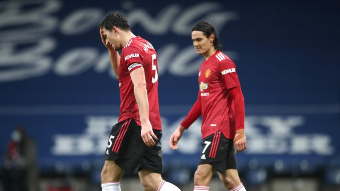 Harry Maguire, Edinson Cavani look dejected Image credit: Getty Images