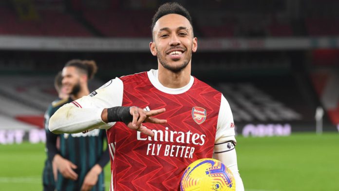 Pierre-Emerick Aubameyang holds the match ball Image credit: Getty Images
