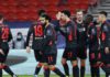 Sadio Mane of Liverpool celebrates with team mates Jordan Henderson and Roberto Firmino after scoring their side's second goal during the UEFA Champions League Round of 16 match between RB Leipzig and Liverpool FC at Puskas Arena on February 16, 2021 Image credit: Getty Images