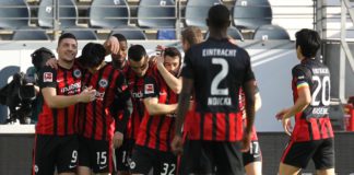 Frankfurt's Japanese midfielder Daichi Kamada (2nd L) celebrates with Frankfurt's Serbian forward Luka Jovic (L) and other teammates after scoring the 1-0 during the German first division Bundesliga football match Eintracht Frankfurt vs FC Bayern Munich i Image credit: Getty Images