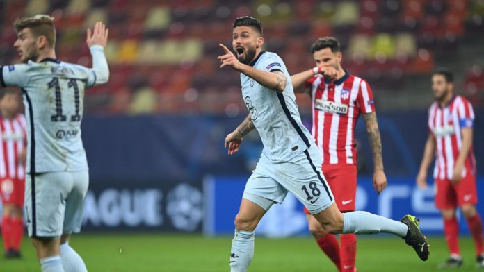 Olivier Giroud of Chelsea reacts as the flag goes up for offside. After a VAR deliberation the offside decision is overturned and Olivier Giroud scores their side's first goal during the UEFA Champions League Round of 16 match between Atletico Madrid and Image credit: Getty Images