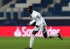 Ferland Mendy of Real Madrid celebrates after scoring their side's first goal during the UEFA Champions League Round of 16 match between Atalanta and Real Madrid at Gewiss Stadium on February 24, 2021 in Bergamo, Italy Image credit: Getty Images
