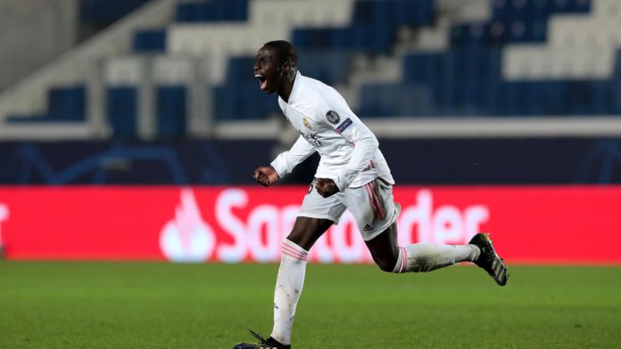 Ferland Mendy of Real Madrid celebrates after scoring their side's first goal during the UEFA Champions League Round of 16 match between Atalanta and Real Madrid at Gewiss Stadium on February 24, 2021 in Bergamo, Italy Image credit: Getty Images