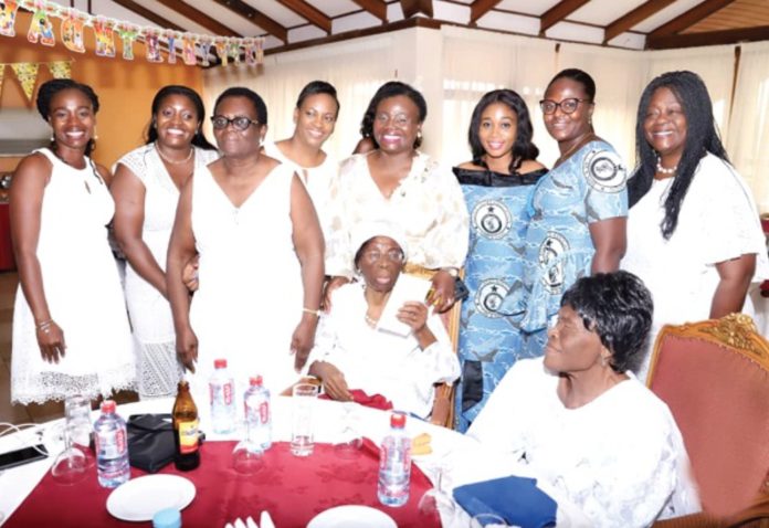 First Ghanaian policewoman (seated in the middle) with her family when she was 90