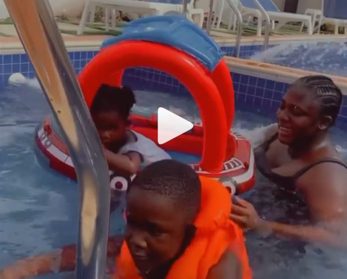 Tracey Boakye and her kids enjoy pool time