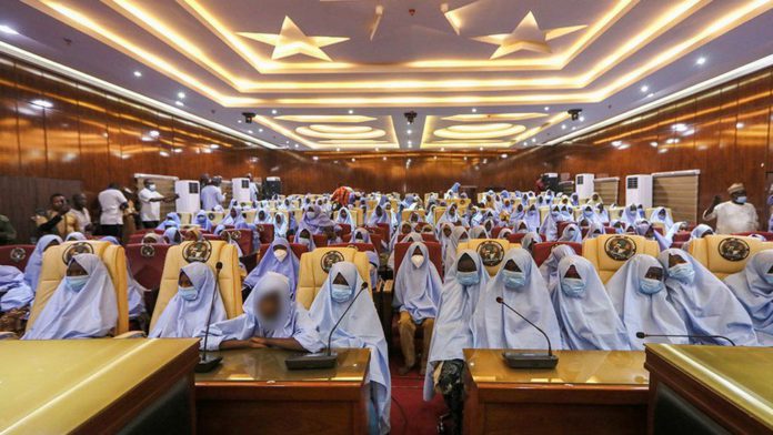 The girls gathered at a state government building following their release