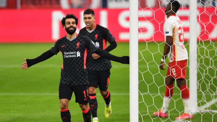 Mohamed Salah of Liverpool celebrates after scoring the first goal during the UEFA Champions League Round of 16 match between RB Leipzig and Liverpool FC at Puskas Arena on February 16, 2021 in Budapest, Hungary Image credit: Getty Images