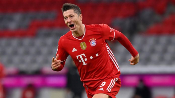 Robert Lewandowski of FC Bayern Muenchen celebrates after scoring their team's fourth goal, completing his hat-trick, during the Bundesliga match between FC Bayern Muenchen and Borussia Dortmund at Allianz Arena on March 06, 2021 in Munich, Germany. Image credit: Getty Images