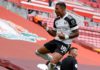 Fulham's Gabonese midfielder Mario Lemina (C) celebrates after scoring the opening goal of the English Premier League football match between Liverpool and Fulham at Anfield Image credit: Getty Images