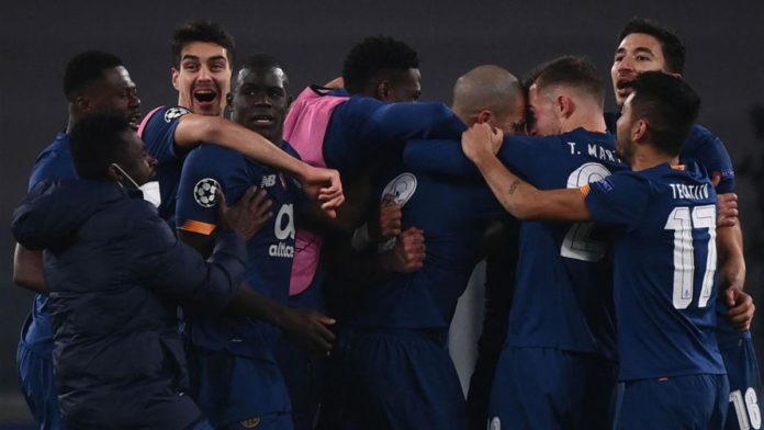 FC Porto's players celebrate after scoring their second goal during the UEFA Champions League round of 16 second leg football match between Juventus Turin and FC Porto Image credit: Getty Images