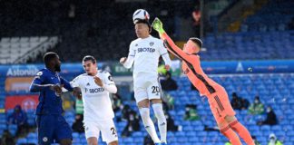 Rodrigo of Leeds United headers the ball, as Illan Meslier of Leeds United looks to punch Image credit: Getty Images