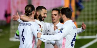Sergio Ramos of Real Madrid celebrates with team mates after scoring their side's second during the UEFA Champions League Round of 16 match between Real Madrid and Atalanta at Estadio Alfredo Di Stefano on March 16, 2021 in Madrid, Spain. Image credit: Getty Images