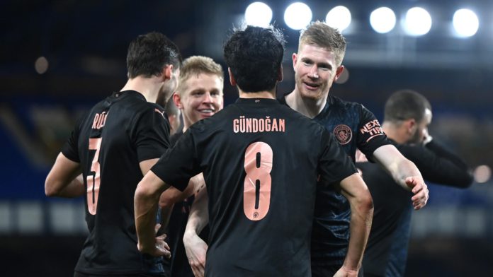 Ilkay Guendogan of Manchester City celebrates with team mate Kevin De Bruyne after scoring their side's first goal during The Emirates FA Cup Quarter Final match between Everton v Manchester City at Goodison Park Image credit: Getty Images