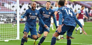 Alexandre Lacazette of Arsenal celebrates with Gabriel Martinelli and Pierre Emerick Aubameyang after scoring their side's third goal during the Premier League match between West Ham United and Arsenal Image credit: Getty Images