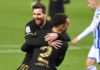 Barcelona's Barcelona's US defender Sergino Dest celebrates with Barcelona's Argentinian forward Lionel Messi (back) after scoring a goal during the Spanish League football match between Real Sociedad and Barcelona Image credit: Getty Images