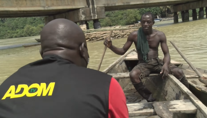 Adom TV's Kobby Stonne interviews a River Ankobra fisherman