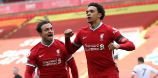 Liverpool's English defender Trent Alexander-Arnold (R) celebrates scoring his team's second goal during the English Premier League football match between Liverpool and Aston Villa at Anfield in Liverpool, north west England on April 10, 2021. Image credit: Getty Images