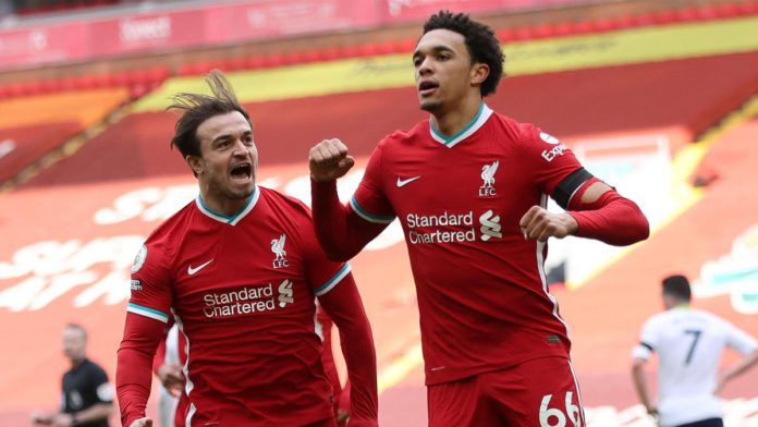 Liverpool's English defender Trent Alexander-Arnold (R) celebrates scoring his team's second goal during the English Premier League football match between Liverpool and Aston Villa at Anfield in Liverpool, north west England on April 10, 2021. Image credit: Getty Images