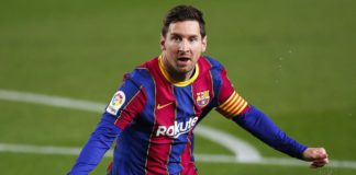 Lionel Messi of FC Barcelona celebrates scoring his side's first goal during the La Liga Santander match between FC Barcelona and Getafe CF Image credit: Getty Images