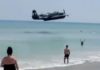The plane flew along just metres above the water