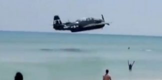 The plane flew along just metres above the water