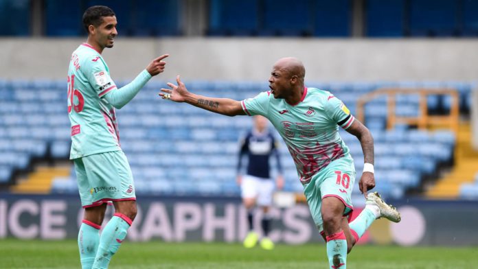 Andre Ayew celebrates with Swansea City teammate