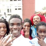 Tyrone Iras Marhguy with his triplet family, together with his father and a relative. Credit: @marhguy_tyrone