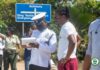 Derek Boateng with a Police Officer