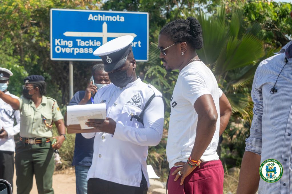 Derek Boateng with a Police Officer