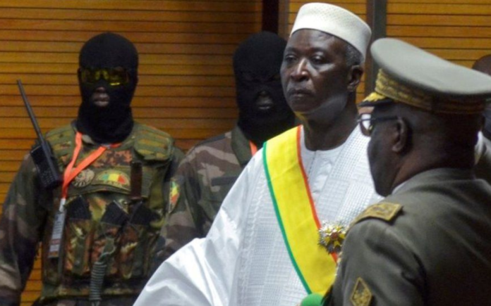 President Bah Ndaw (centre) is reportedly being held by Malian soldiers near the capital Bamako