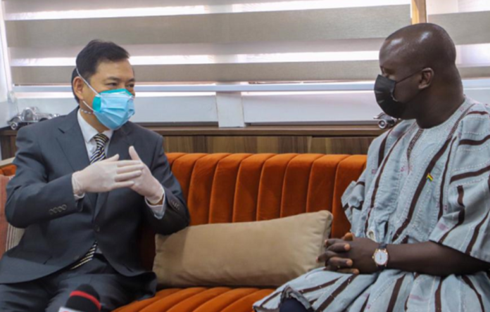 Mr Lu Kun (left), the Chinese Ambassador to Ghana, holding discussions with Mr Samuel Abu Jinapor, the Minister of Lands and Natural Resource, in Accra yesterday