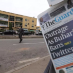 A man looks at newspapers at a newsstand in Abuja, Nigeria June 5, 2021 REUTERS - AFOLABI SOTUNDE