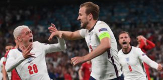 England's forward Harry Kane (R) celebrates with England's midfielder Phil Foden (L) after scoring a goal during the UEFA EURO 2020 semi-final football match between England and Denmark at Wembley Stadium in London on July 7, 2021. Image credit: Getty Images