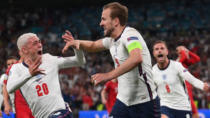 England's forward Harry Kane (R) celebrates with England's midfielder Phil Foden (L) after scoring a goal during the UEFA EURO 2020 semi-final football match between England and Denmark at Wembley Stadium in London on July 7, 2021. Image credit: Getty Images
