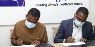 CEO of Africa Health Holdings Sangu Delle [in brown] and Dr Maxwell Antwi Country Director of PharmAccess [in blue]