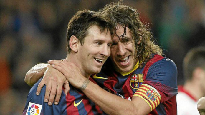 Carles Puyol and Messi
