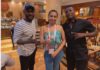 Asamoah Gyan [R] with Mimi Fawaz [M] of BBC