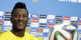 Ghana's Asamoah Gyan attends a news conference before an official training session the day before the group G World Cup soccer match between Ghana and the United States at the Arena das Dunas in Natal, Brazil, Sunday, June 15, 2014. (AP Photo/Dolores Ochoa)