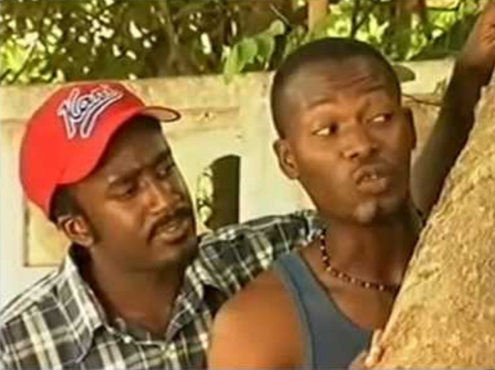 Zimran Clottey as Aluta and Adjetey Anang as Pusher in 'Things We Do For Love'